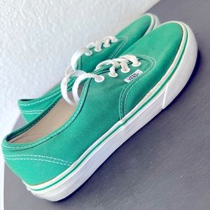 Men’s Vans. Green. Low top canvas. Lace up. Size 6 men’s. Size 7.5 women’s.